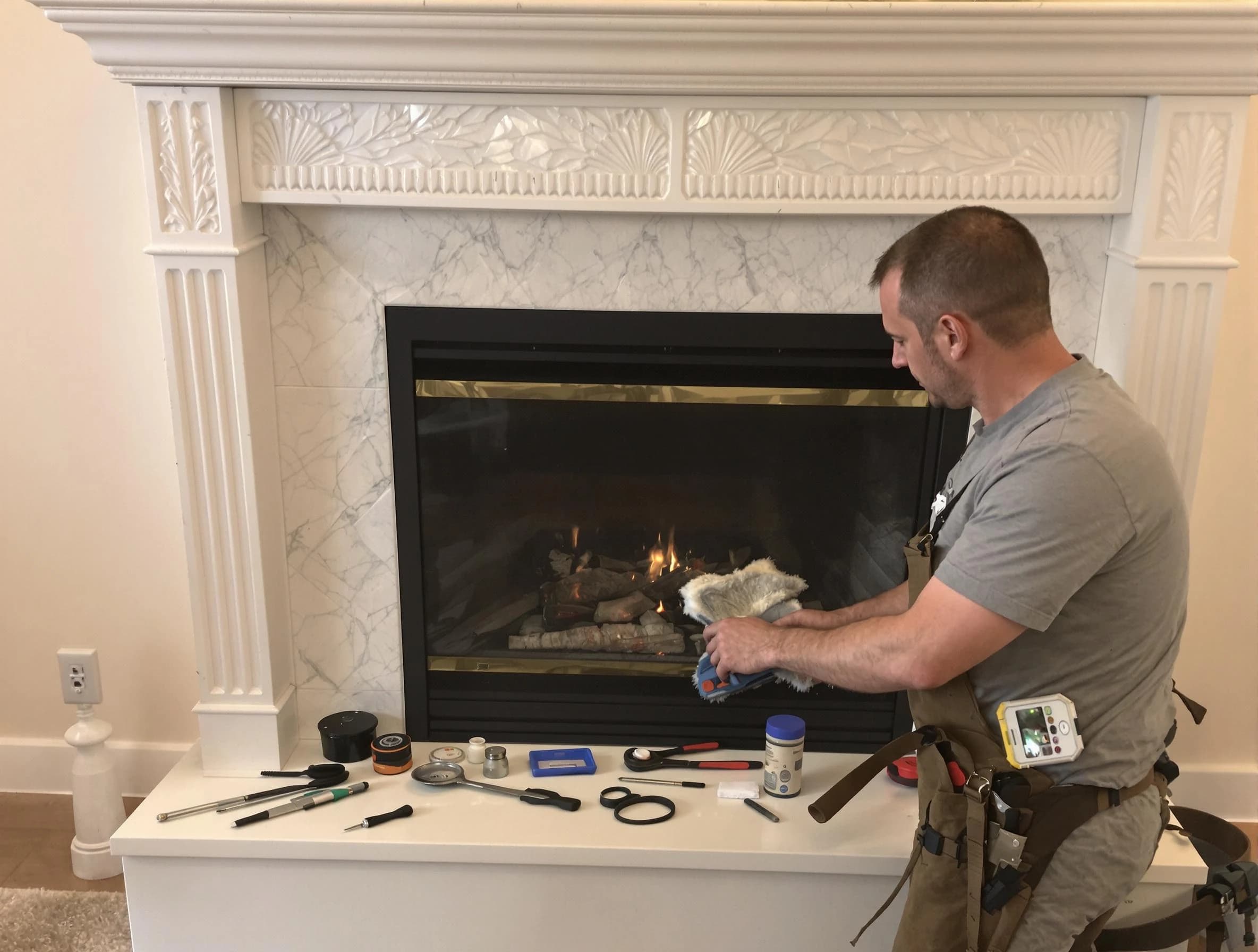 Randolph Chimney Sweep performing fireplace maintenance in Randolph, MA